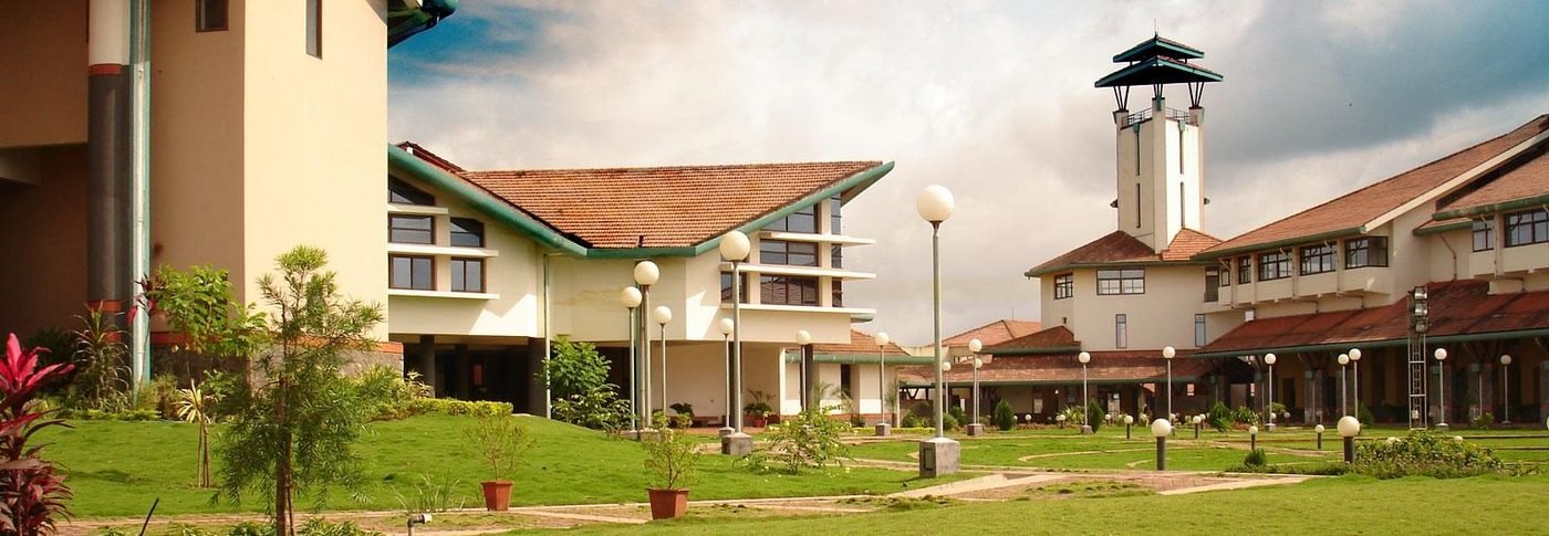 IIM Kozhikode campus building with clock tower, Kerala